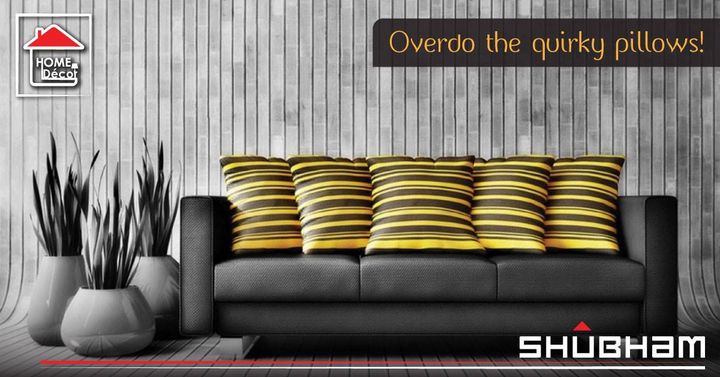 Enhance your living room having grey tone with these quirky bright yellow pillows that will make the house livelier with a touch of style.